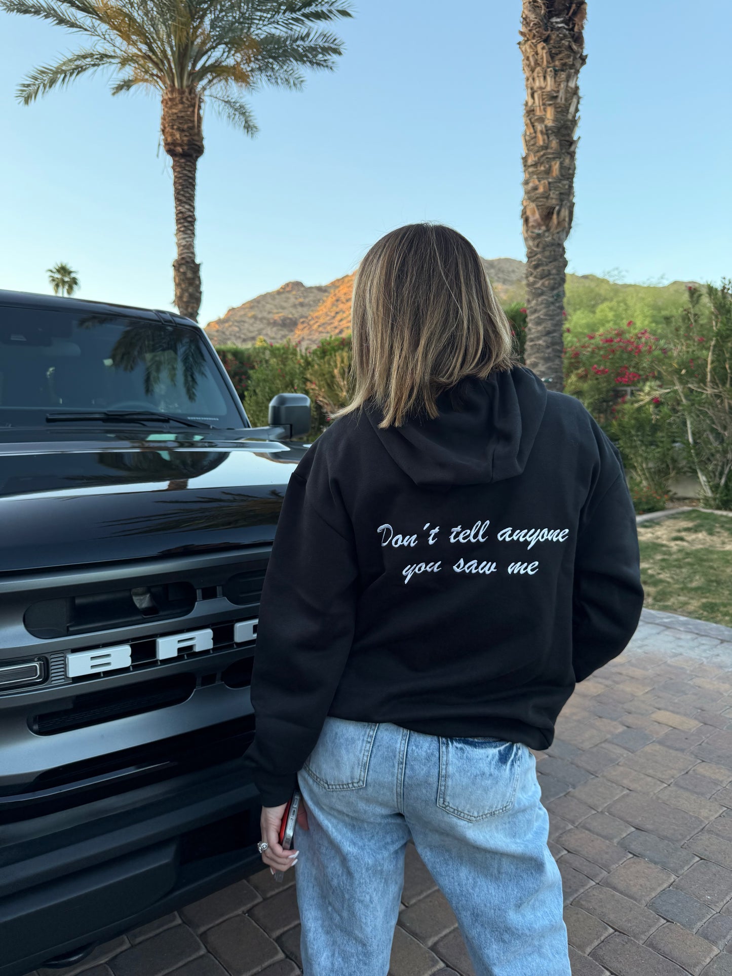 DON'T TELL ANYONE HOODIE